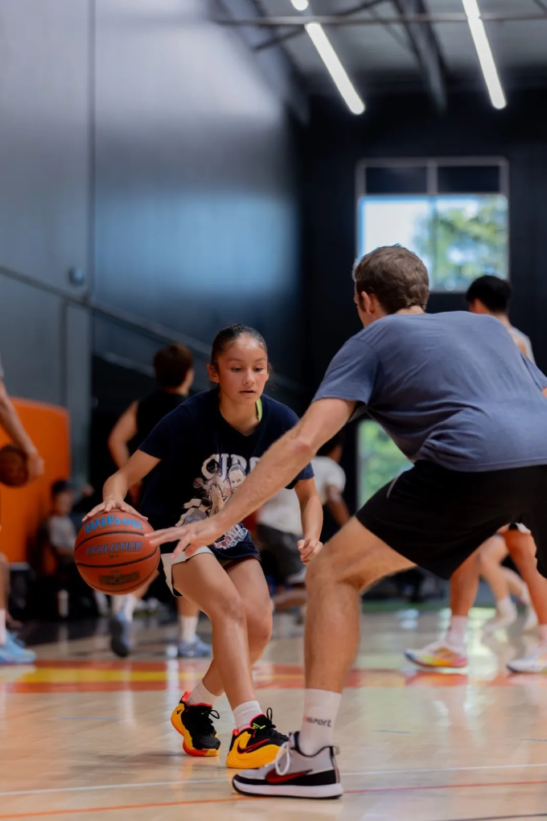 Live one-on-one, defender in a stance.